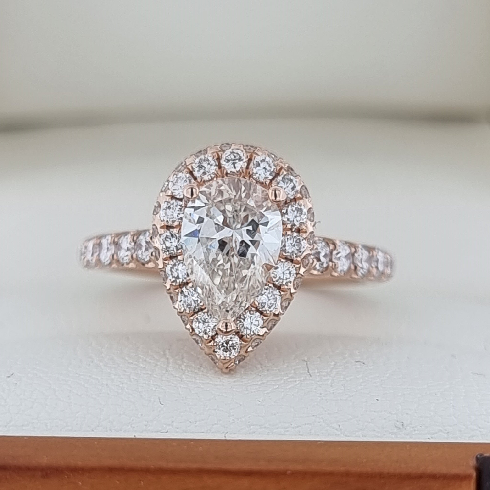 Exquisite Pear Cut Halo in Rose Gold