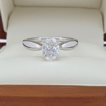 Elegant 18 Carat White Gold & Oval Cut Diamond Engagement Ring